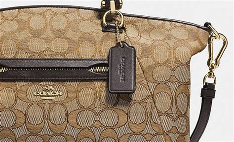 coach flight bag fake|coach handbags with symbol on.